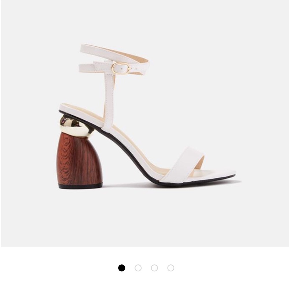 White sandal with wooden heel